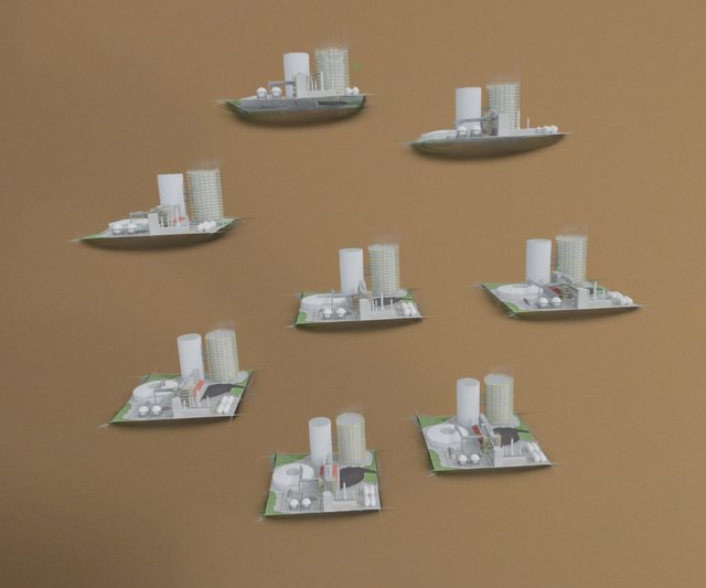 Eight Gaussian splat models of an industrial plant on the headset, in passthrough.